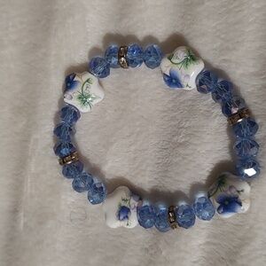Blue Beaded Bracelet with Floral Accents